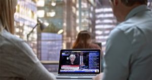 man and woman watching in laptop | interest rates