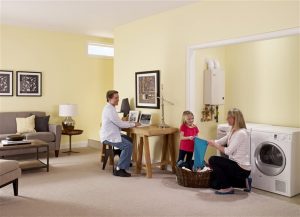 family of three doing laundry | rebates