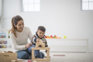 mom and son playing | furnance