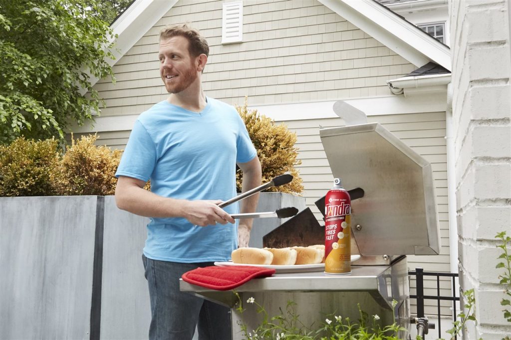 a man grilling | Chattanooga Home Inspector | Kitchen Safety Tips Chattanooga