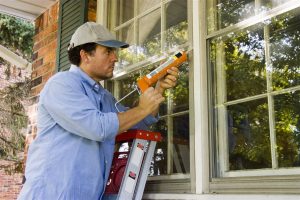 a contractor Sealing window | Chattanooga Home Inspector | winter home problem Chattanooga