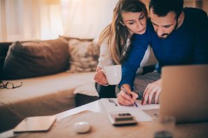 a couple working on papers | Chattanooga Home Inspector | buy a home Chattanooga