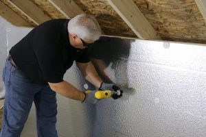 contractor works on the attic | Chattanooga Home Inspector | energy bills Chattanooga