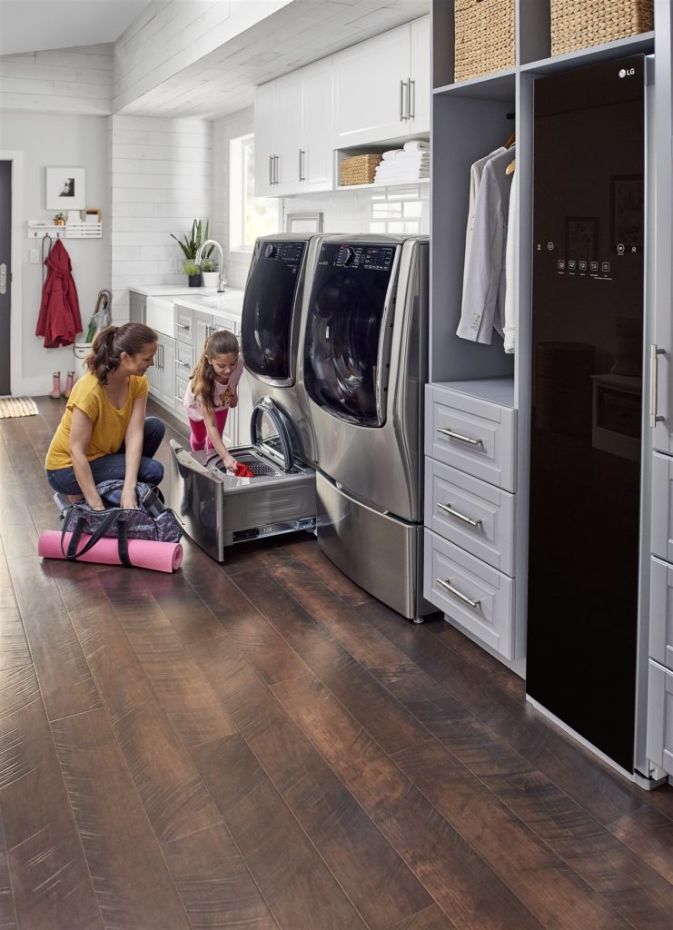 mother and child doing laundry | Chattanooga Home Inspector | Household routine Chattanooga